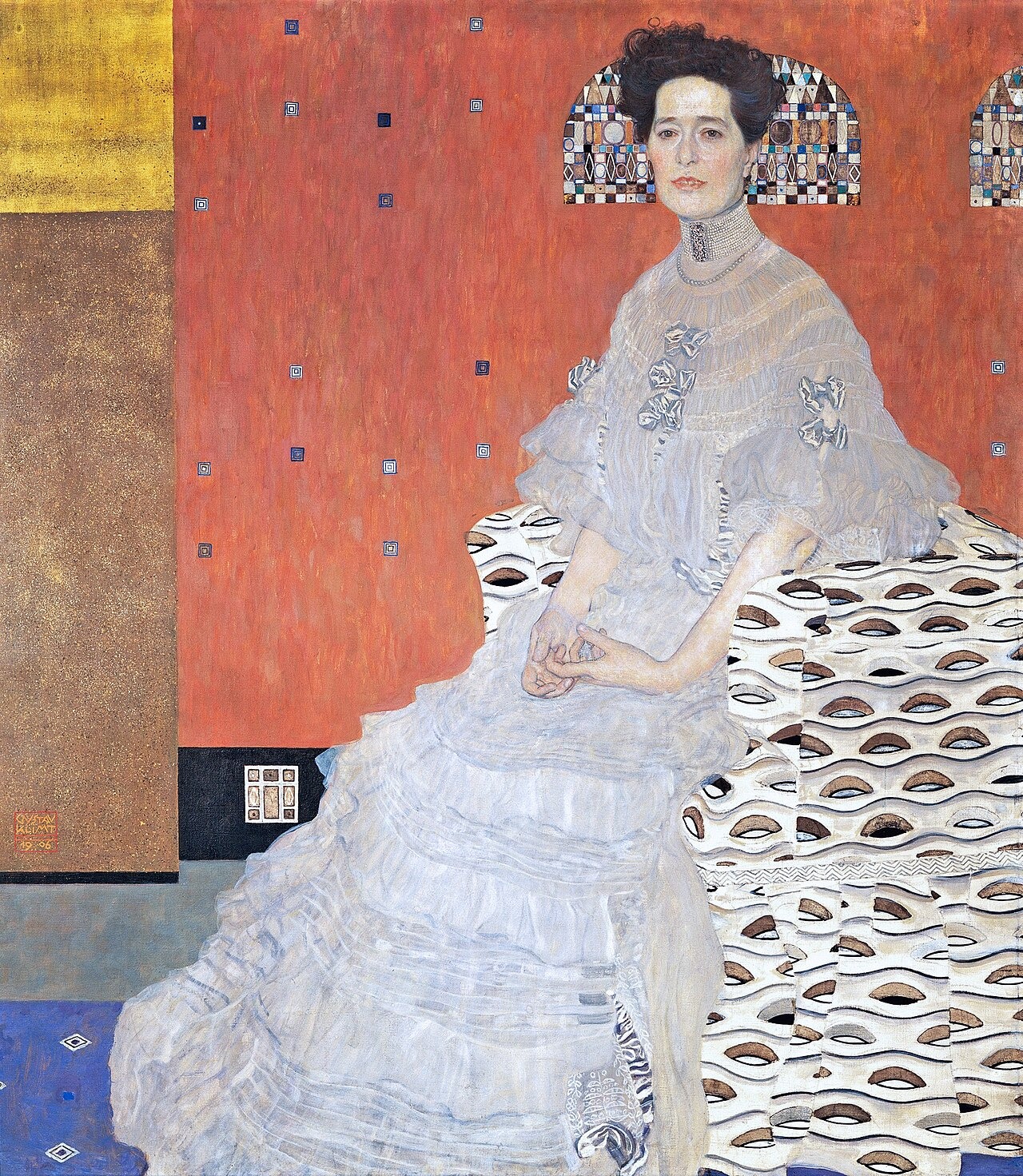 A seated woman in a white dress faces forward, with eye-like patterns around her chair and a red background.
