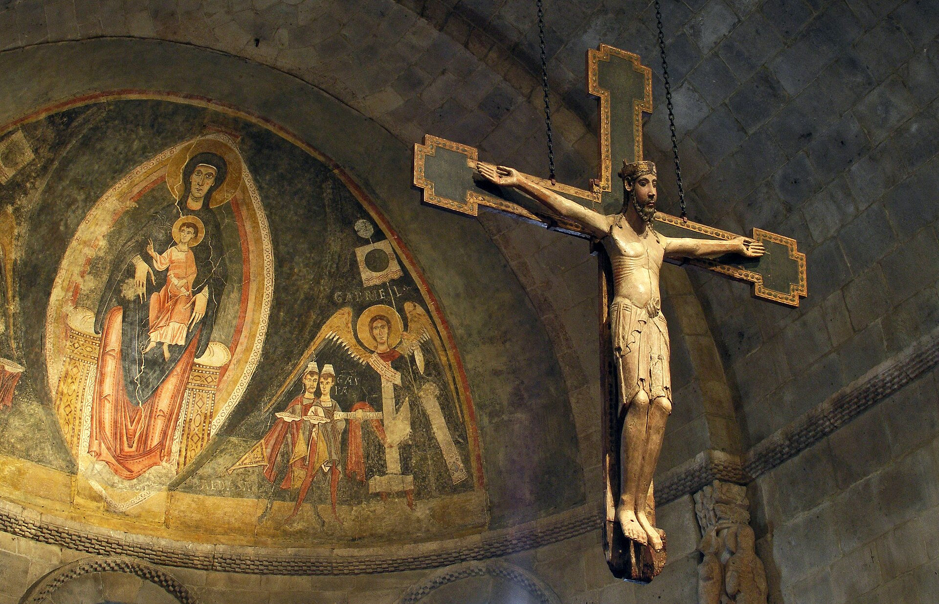 Medieval painted apse and hanging crucifix in the Fuentidueña Chapel at The Met Cloisters