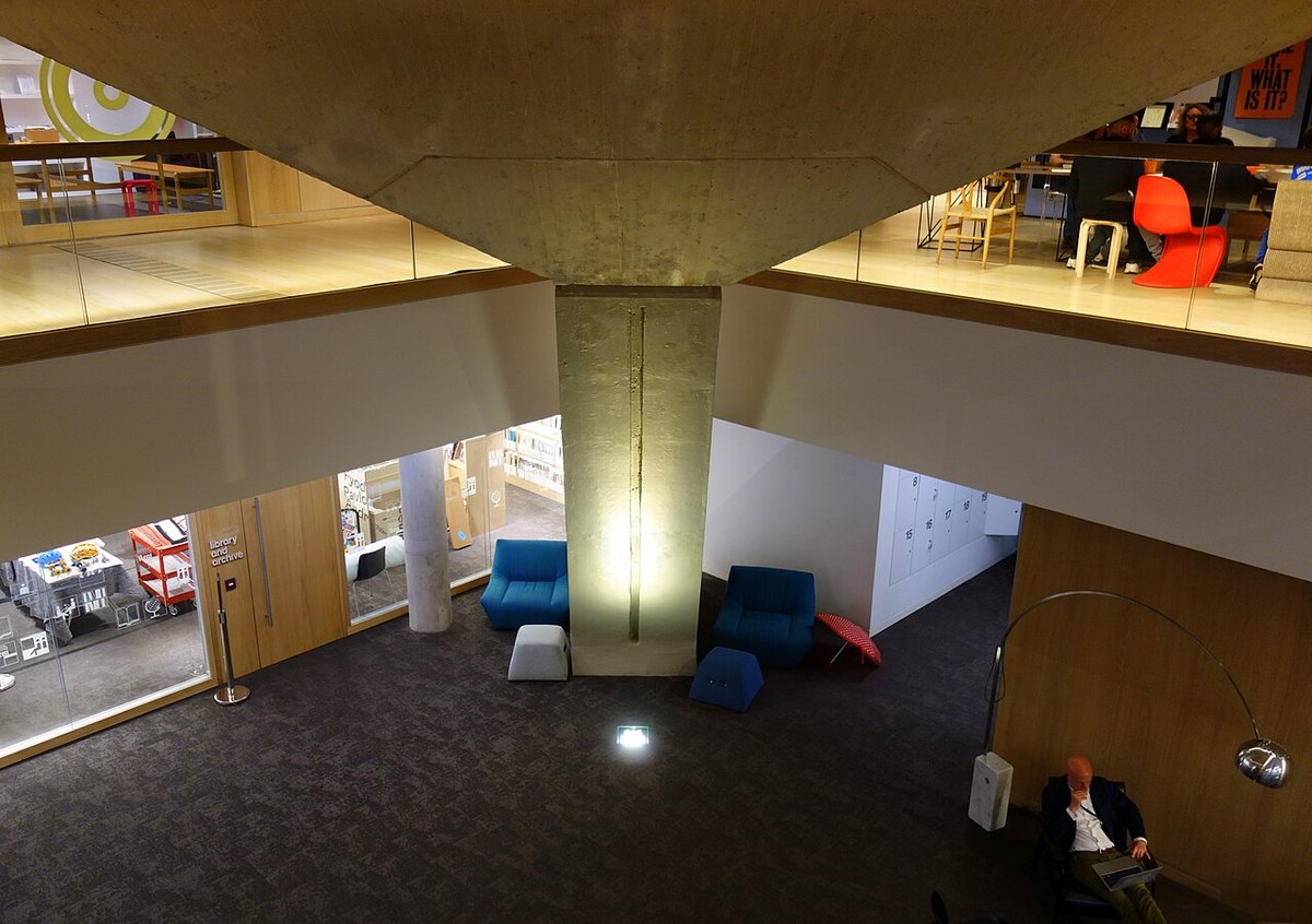 The Design Museum’s open atrium beneath its sweeping roof.
