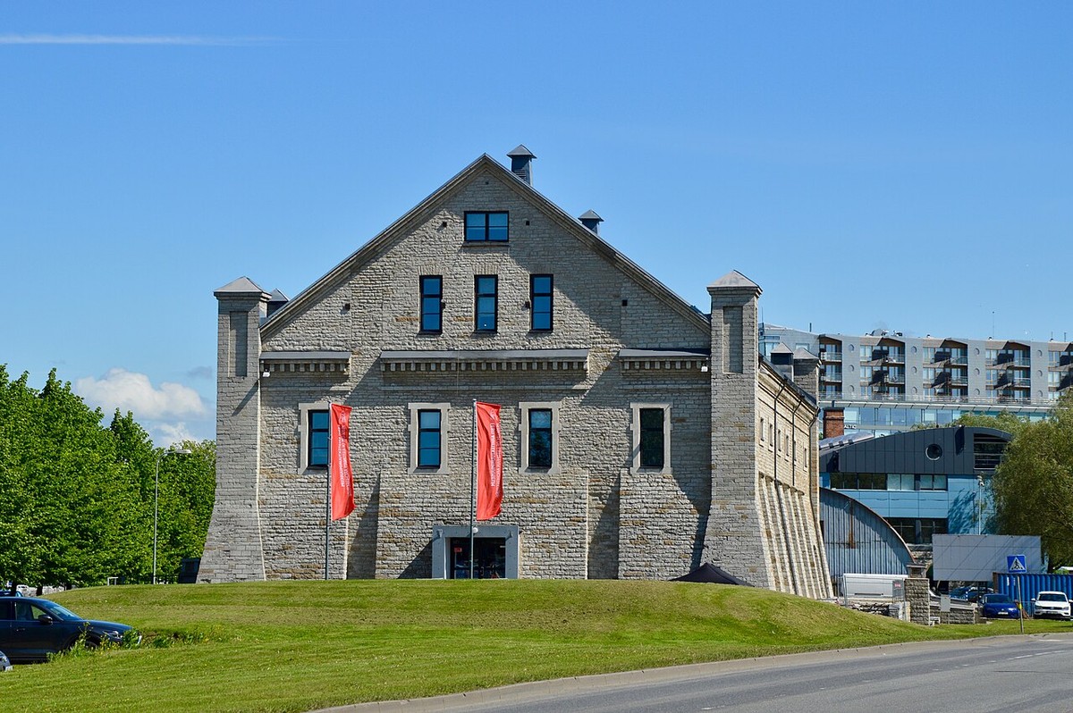The limestone gable of Rotermann Salt Storage beneath a blue sky.