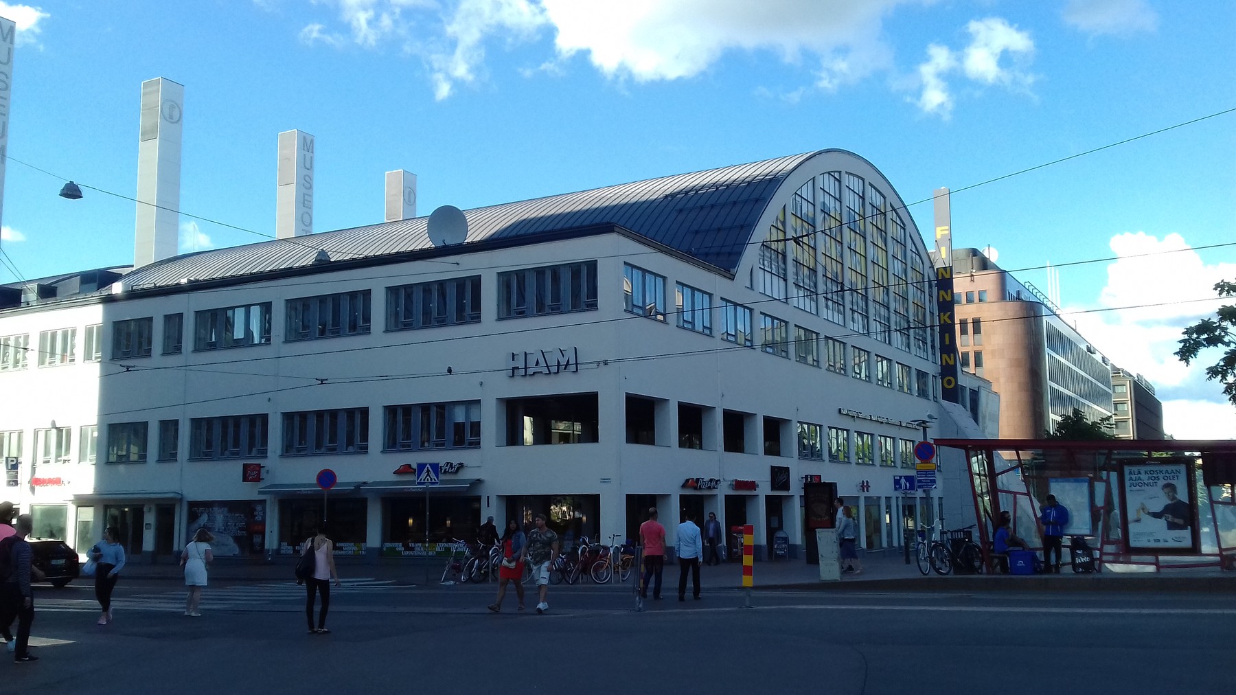 Tennispalatsi’s pale façade and tall arched upper windows in Helsinki.