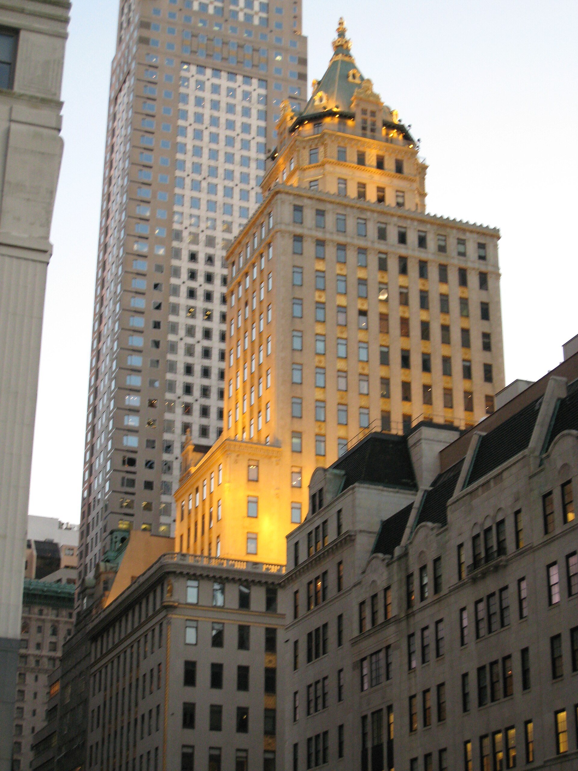 The gilded Crown Building at Fifth Avenue and 57th Street, now Aman New York and once MoMA's first home.