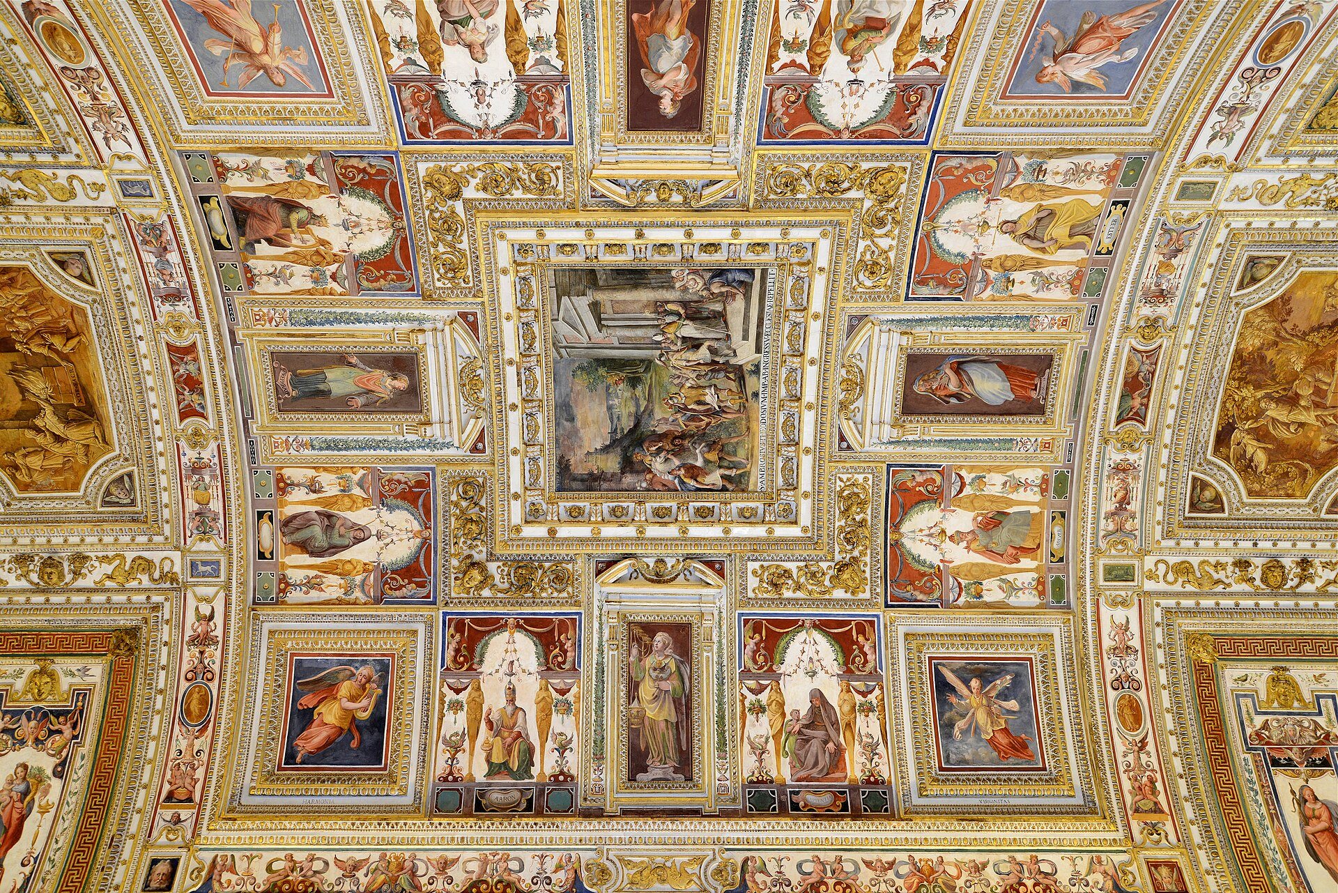 The gilded ceiling and painted maps of the Gallery of Maps in the Vatican Museums.