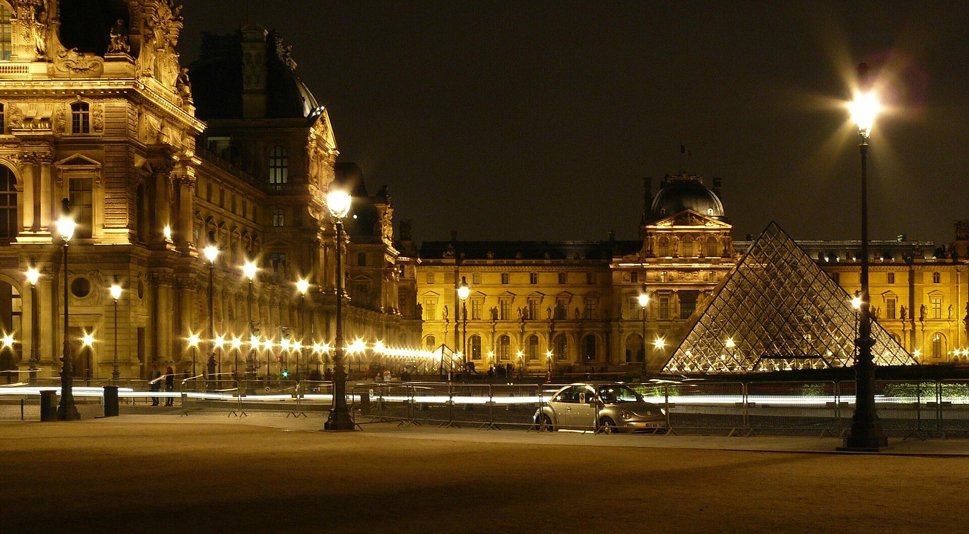 The Louvre palace and Pyramid in the Cour Napoléon.