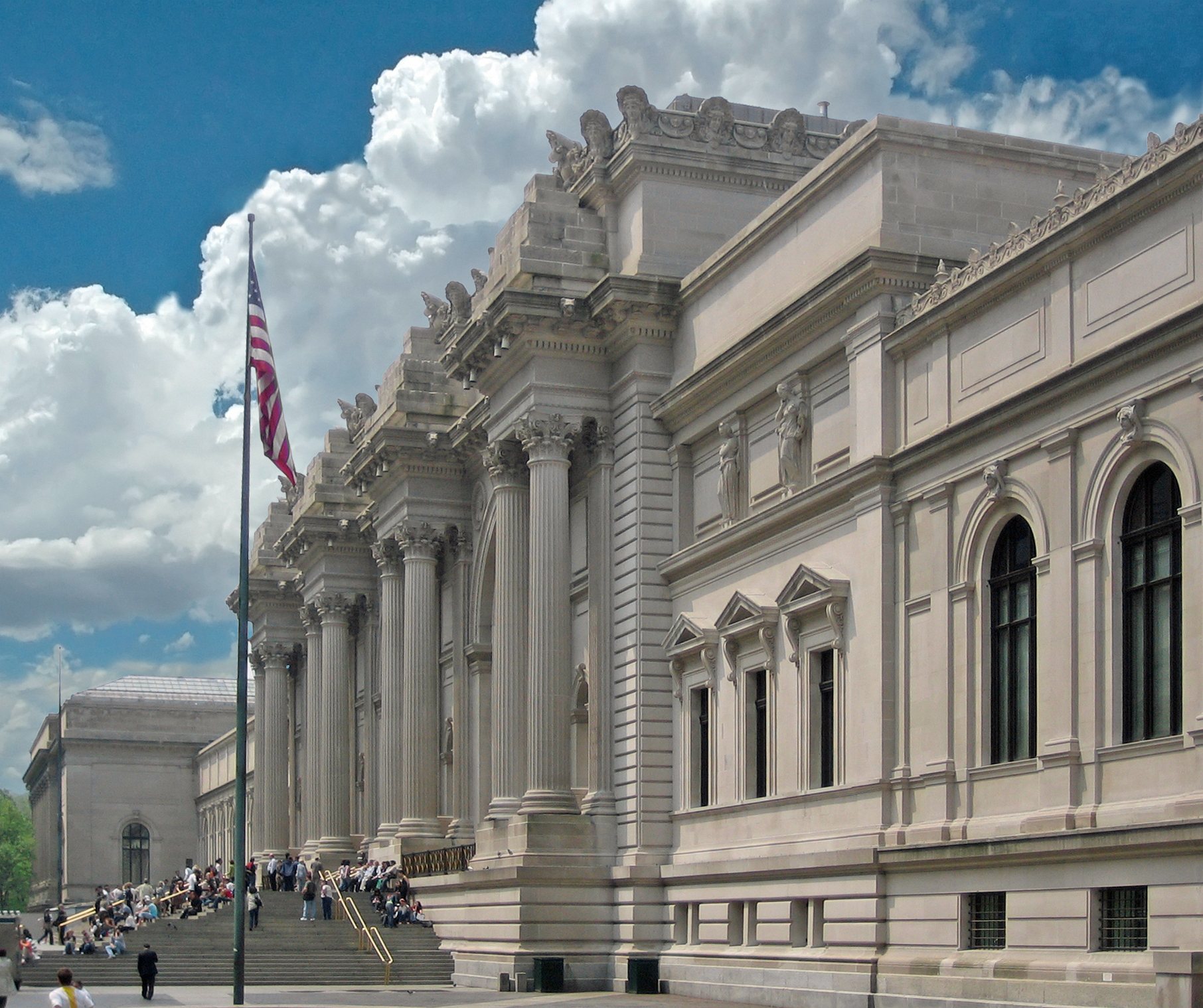 The Beaux-Arts facade and steps of the Metropolitan Museum of Art on Fifth Avenue.