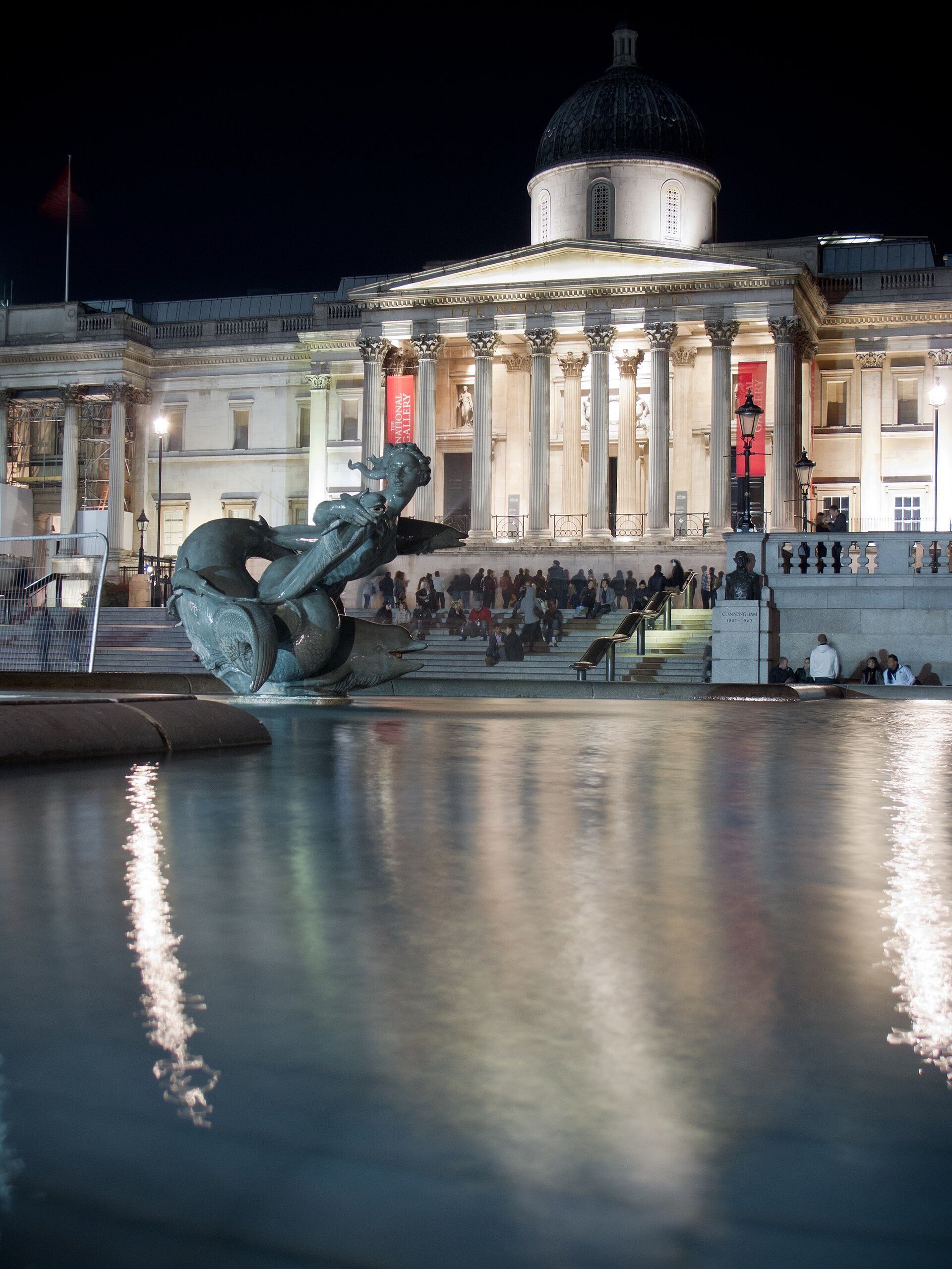 The National Gallery seen across the fountains of Trafalgar Square.