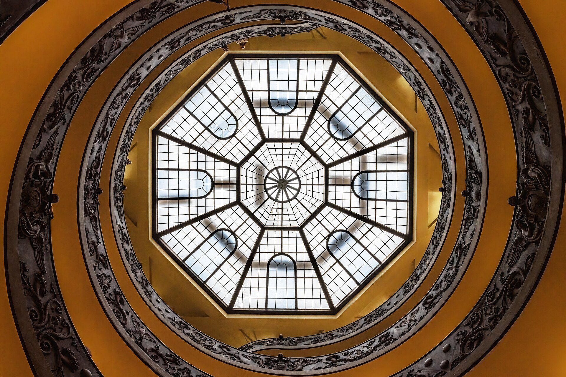 The Bramante-style spiral staircase in the Vatican Museums seen from below.