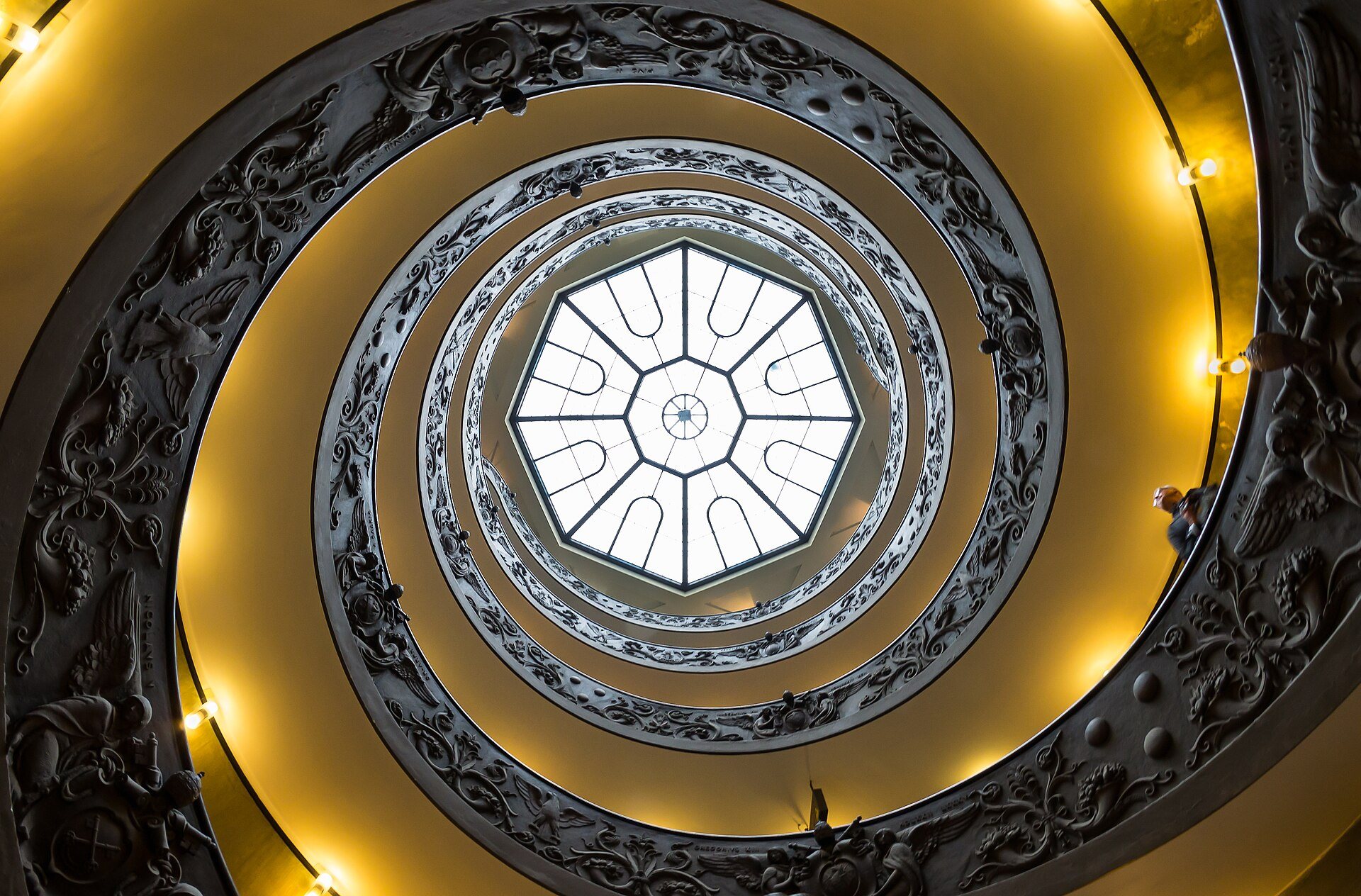 Looking up the spiral staircase at the Vatican Museums exit.