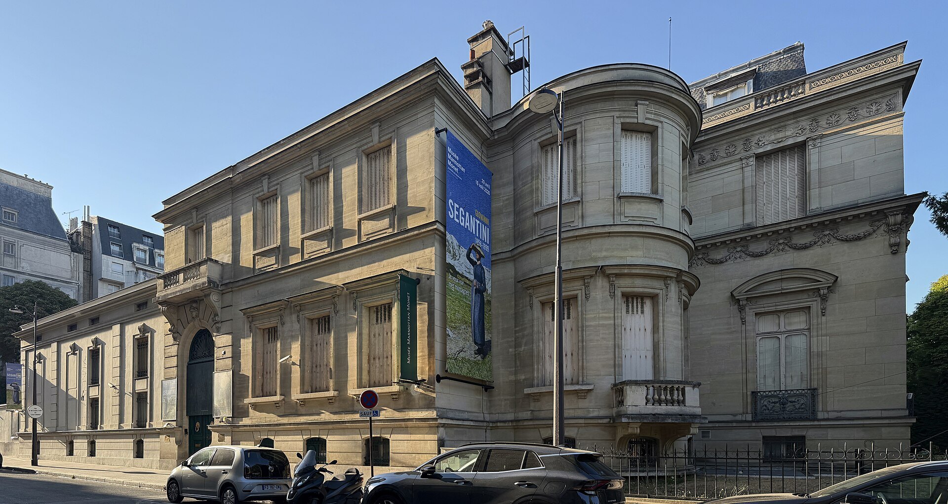 The pale-stone façade of Musée Marmottan Monet under a clear blue sky