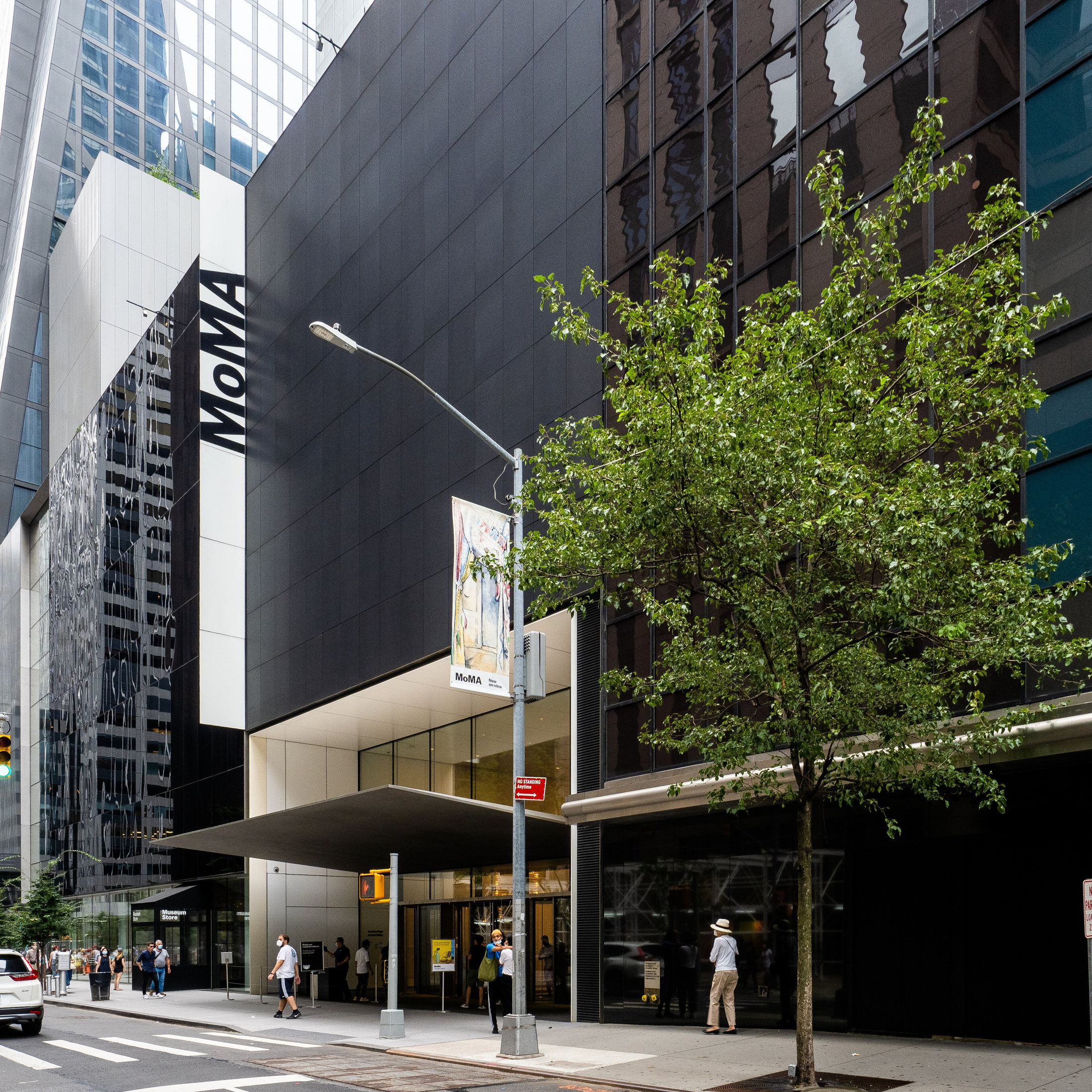 MoMA’s West 53rd Street entrance and projecting vertical sign