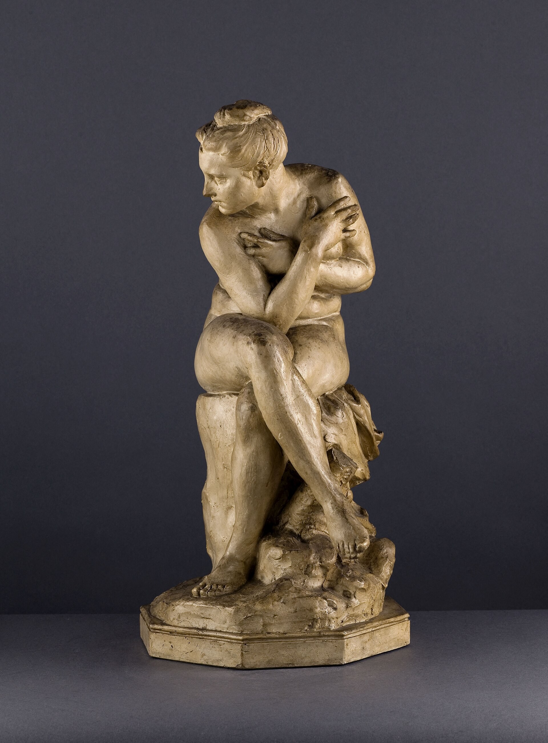 A patinated sculpture of a crouching woman shields her body in Dalou’s Baigneuse surprise.